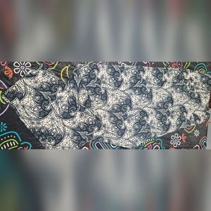 Cream and black lace bat leggings